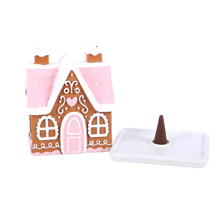 Roze peperkoekenhuisje geurkegelbrander